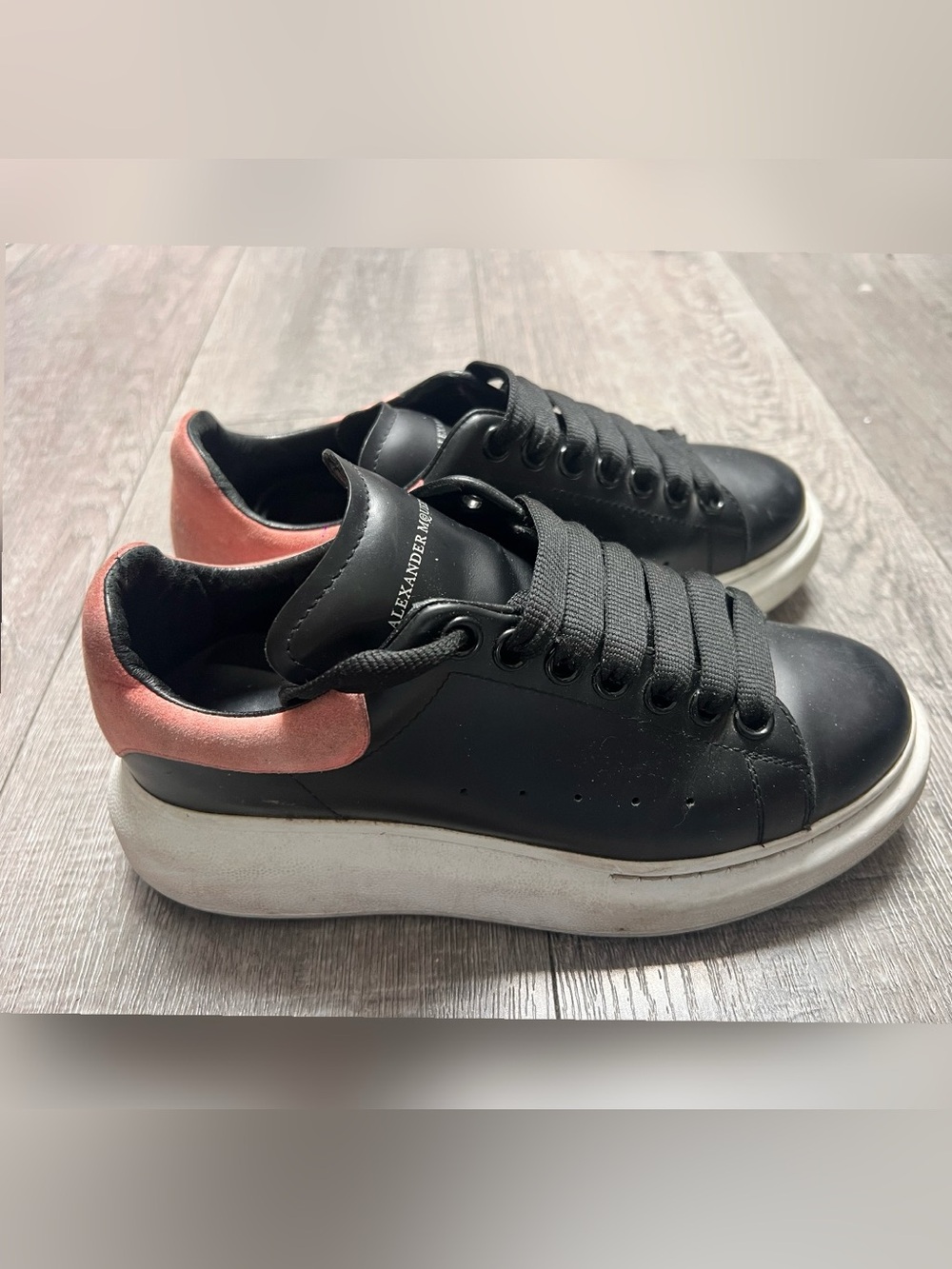 Alexander McQueen
Oversized Sneakers in black/pink Size 6 $600